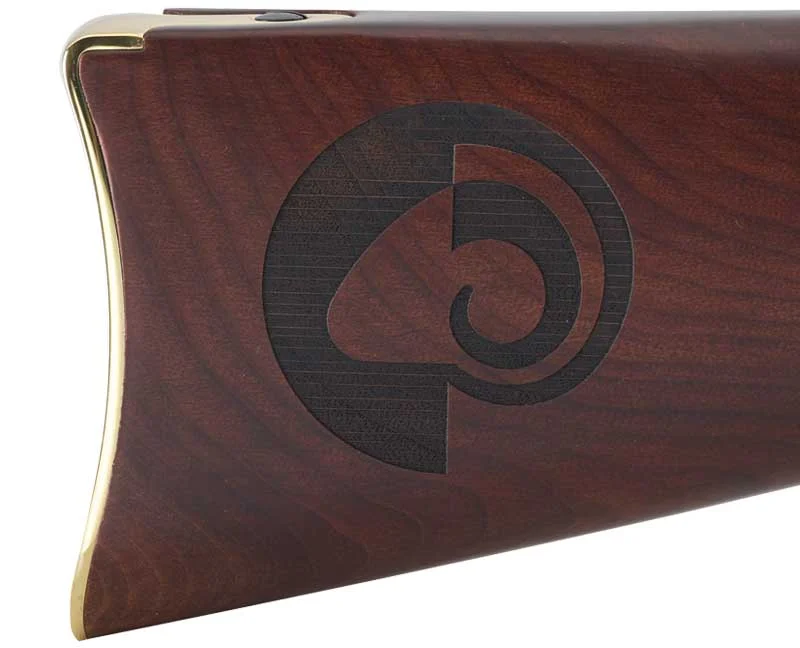 Detailed view of the intricate laser-engraved stock design on a custom Henry lever-action rifle