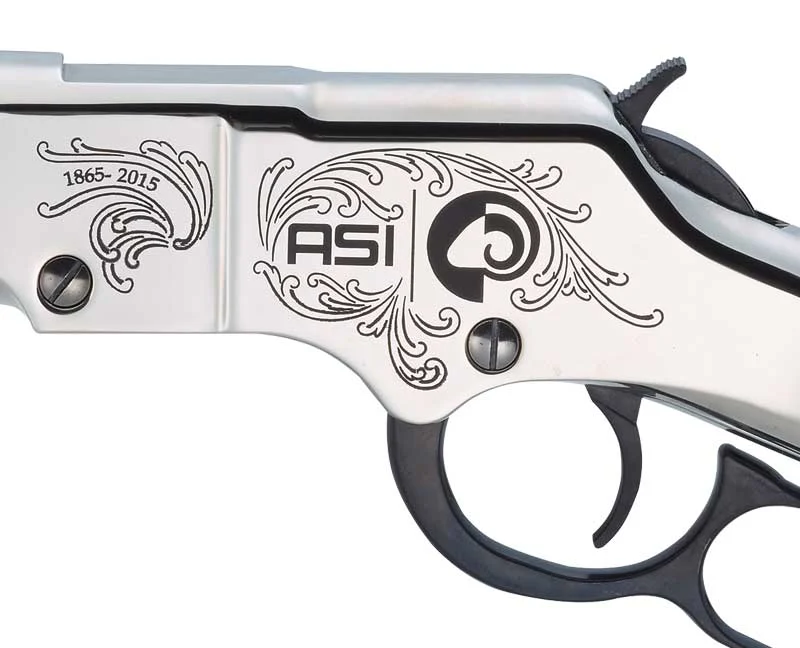 Close-up view of a Henry Repeating Arms rifle with intricate engraved detailing on the receiver