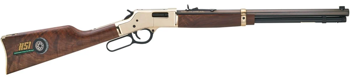 Henry lever-action rifle with custom engraving and wooden stock, a high-quality American-made firearm for hunting, shooting sports, and tactical applications