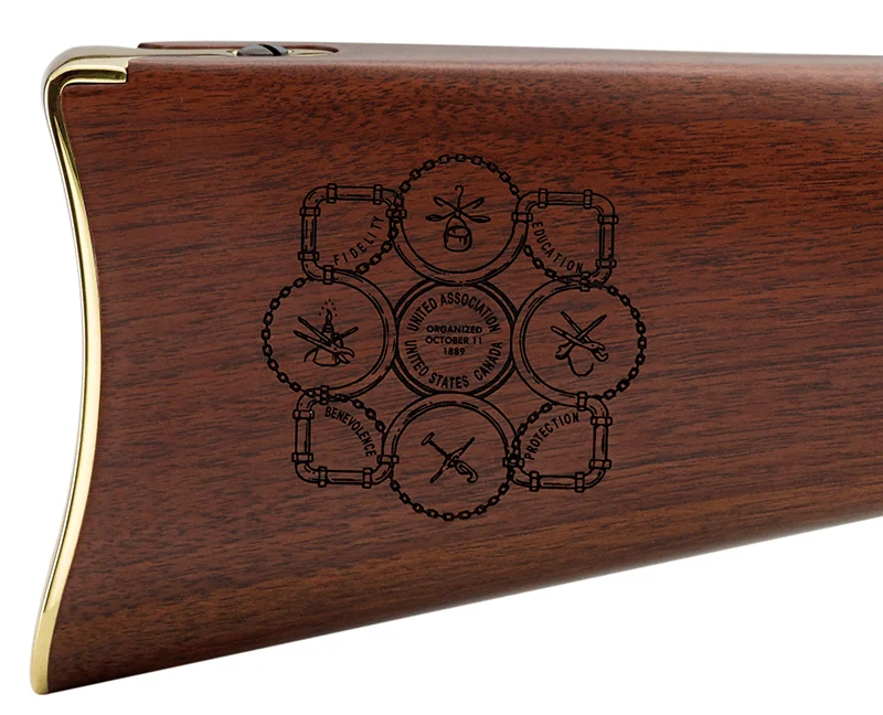Engraved detail on wooden rifle stock showcasing customization options for Henry Repeating Arms firearms