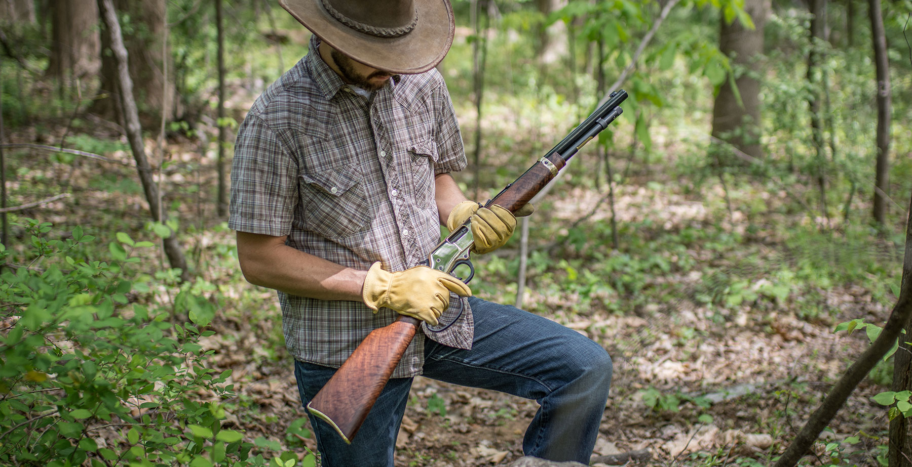 Henry Rifles- Lever Action Today Article- man holding rifle