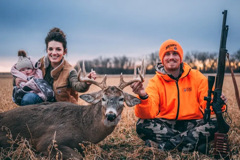 Custom Henry Golden Boy lever-action rifle with engraved department badge design on American walnut stock