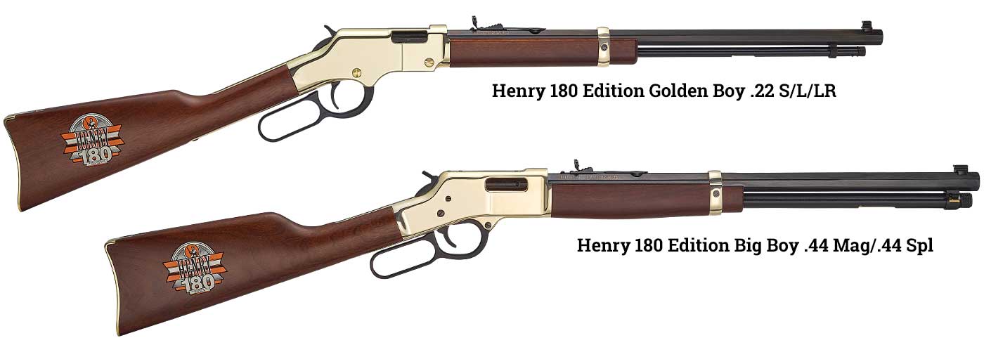 Two Henry 180 Edition lever-action rifles in commemorative golden finish