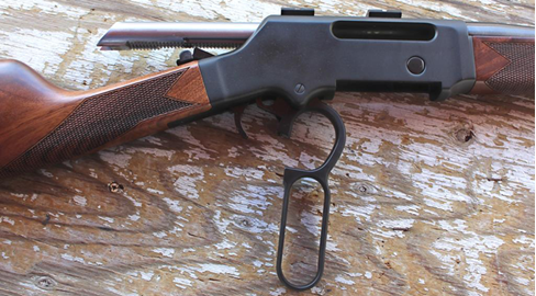 Close-up view of lever-action rifle mechanism and features