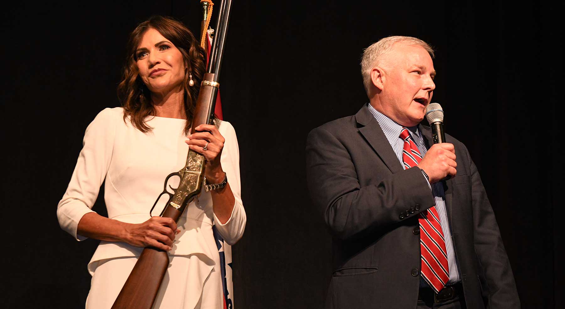 South Dakota Governor Kristi Noem receiving custom engraved Henry Big Boy lever-action rifle