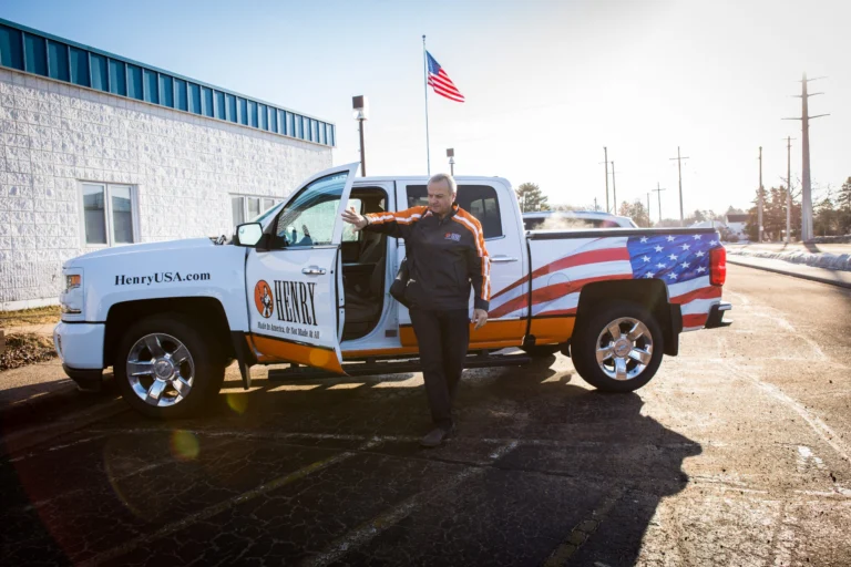 Man enters headquarters of Henry Repeating Arms, a leading American firearms manufacturer