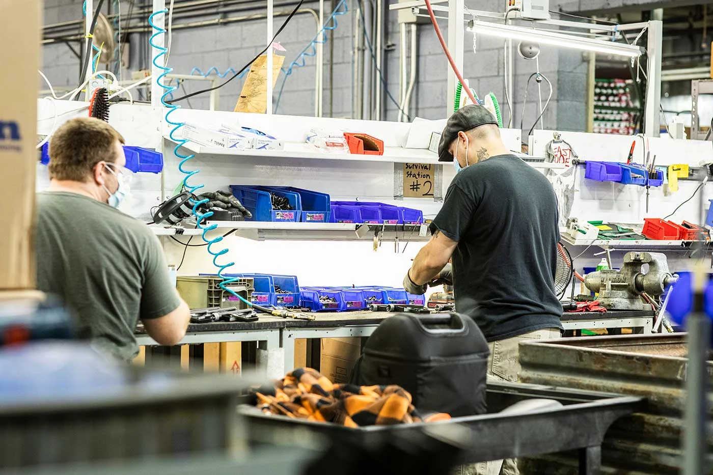 Henry Repeating Arms factory workers assembling rifles and firearm components