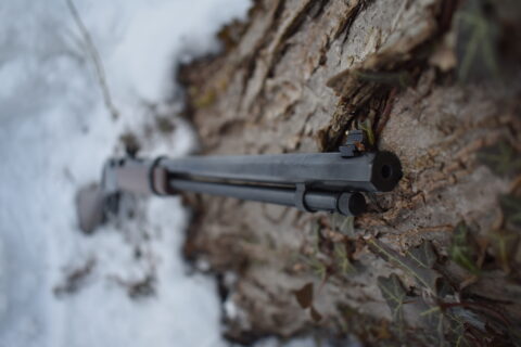 Closeup view of the octagon barrel on a Henry rifle.