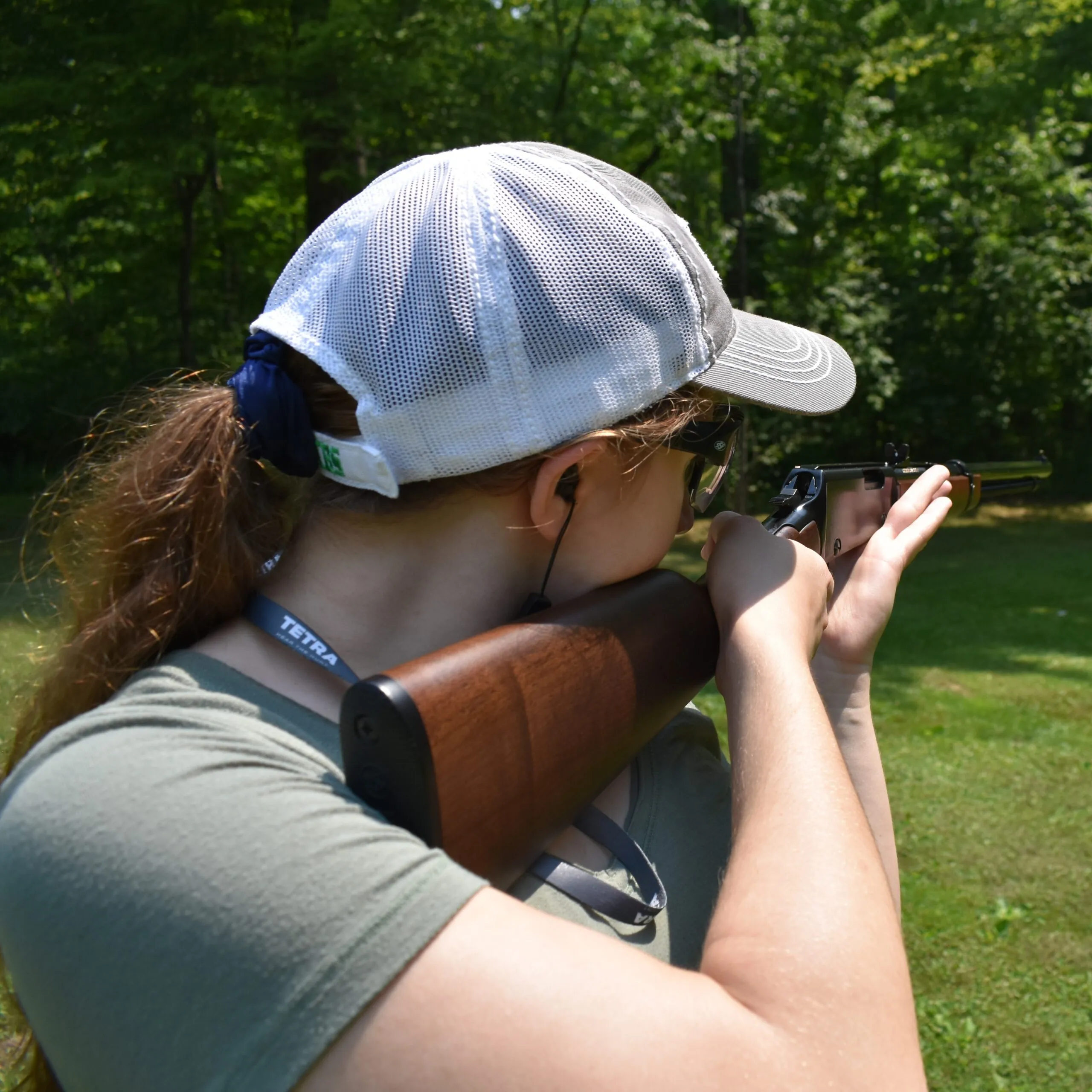 Author shooting a rifle offhand.