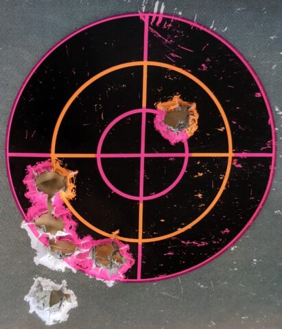 Bullet holes in a paper target