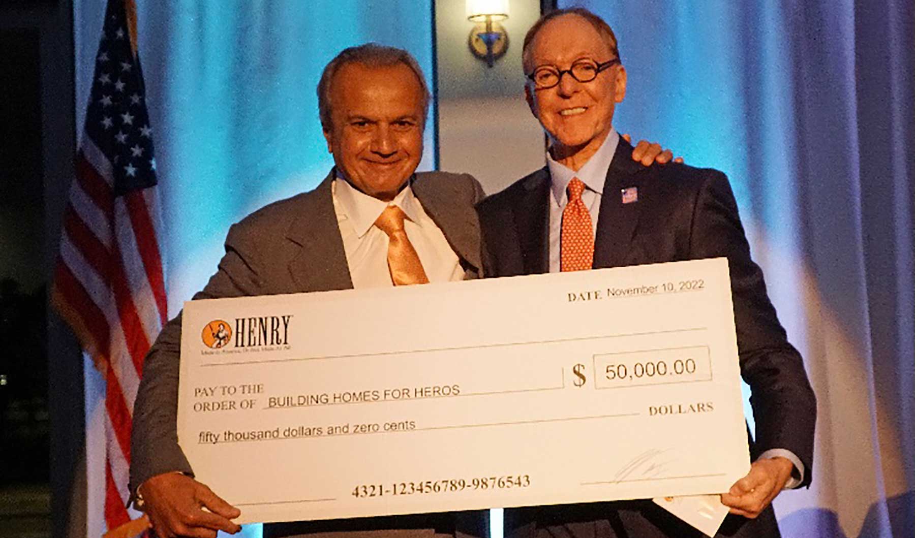 Henry Repeating Arms CEO presents $50,000 donation check to Building Homes for Heroes for veteran housing support