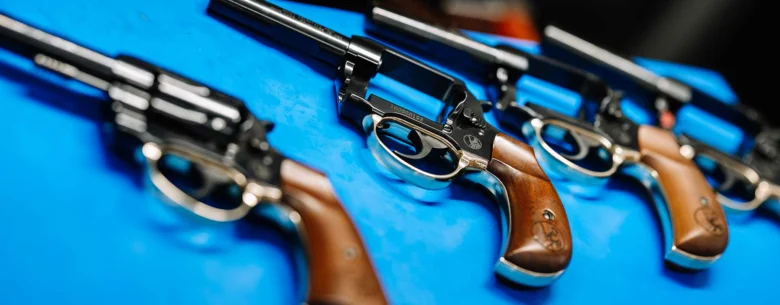 Assortment of Henry lever-action revolvers in various finishes and calibers