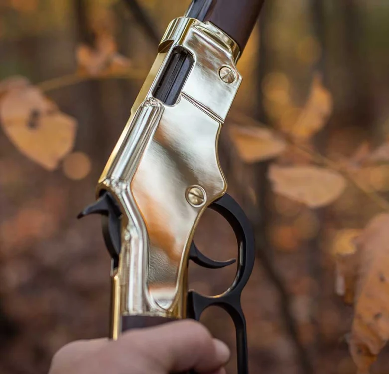 Close-up view of the receiver on a Henry lever-action rifle, showcasing its high-quality craftsmanship and attention to detail