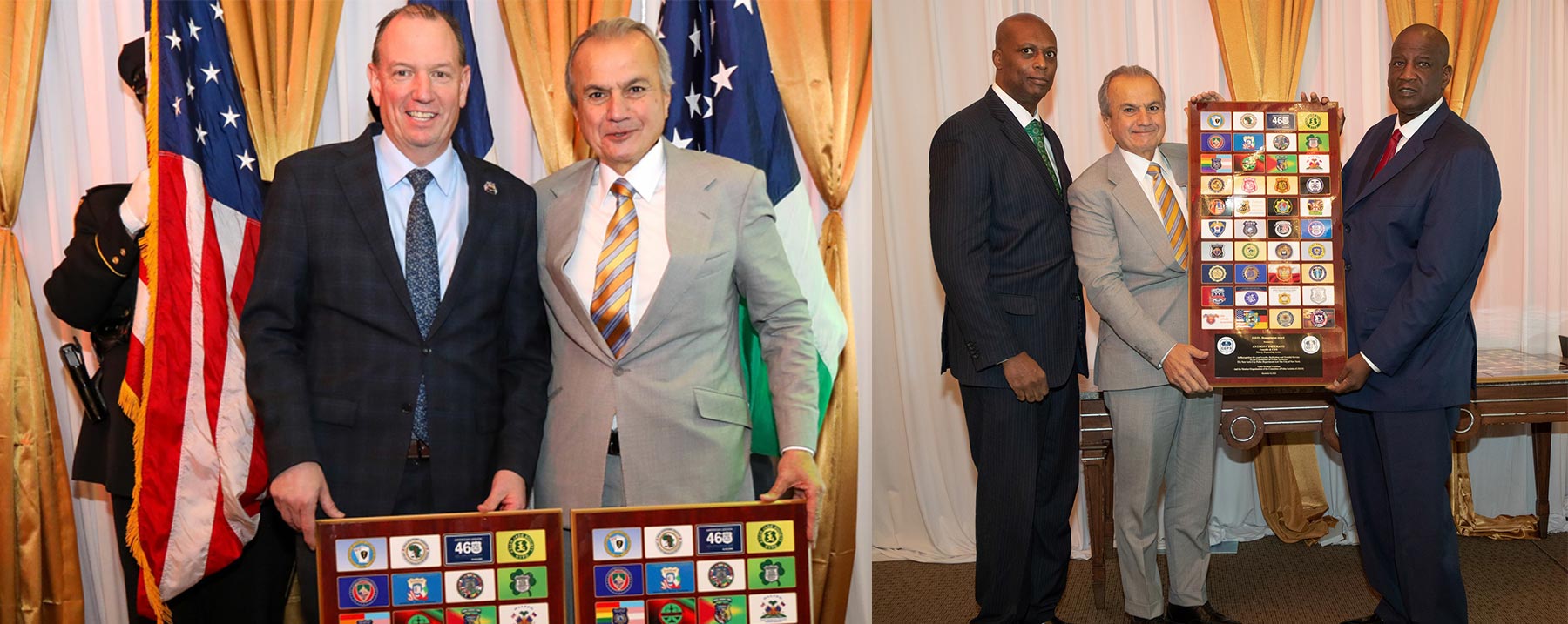 Three men in business suits standing with an award plaque displaying the Henry Repeating Arms logo and branding