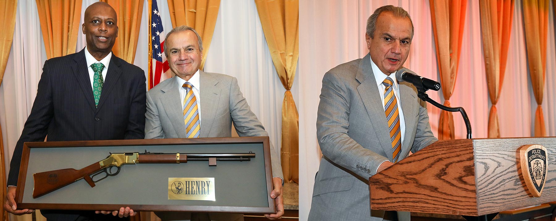 Three men in business suits standing with an award plaque displaying the Henry Repeating Arms logo and branding