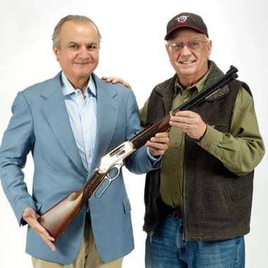Henry Repeating Arms CEO Anthony Imperato and company founder displays custom lever-action rifles donated to charity