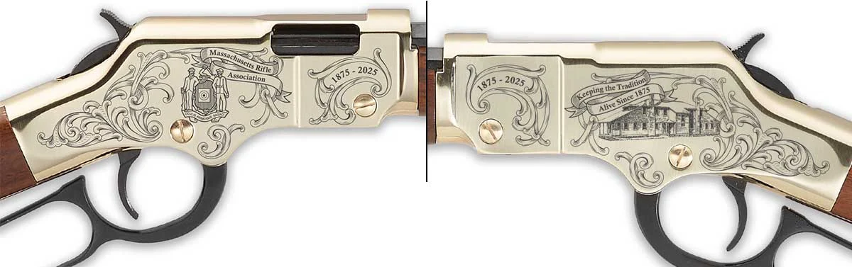 Gold-toned commemorative revolver with intricate floral engravings and inscriptions: 'Massachusetts Rifle Association' and '1875-2025' across the frame.