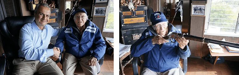 Side by side photos of Anthony Imperato shaking hands with Louis Zamperini and Zamperini holding an engraved rifle up to his shoulder.