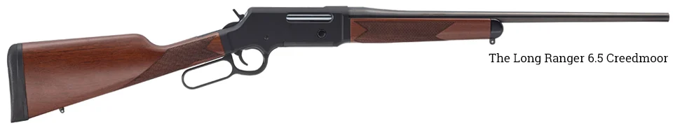 Henry Repeating Arms 6.5 Creedmoor lever-action rifle with 22-inch blued steel barrel, walnut stock, and sights