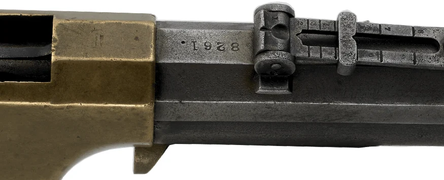 Close-up view of Henry lever-action rifle from 1860 with iron sights and serial number