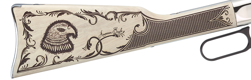 Henry Repeating Arms lever-action rifle with intricate American eagle engraving on stock