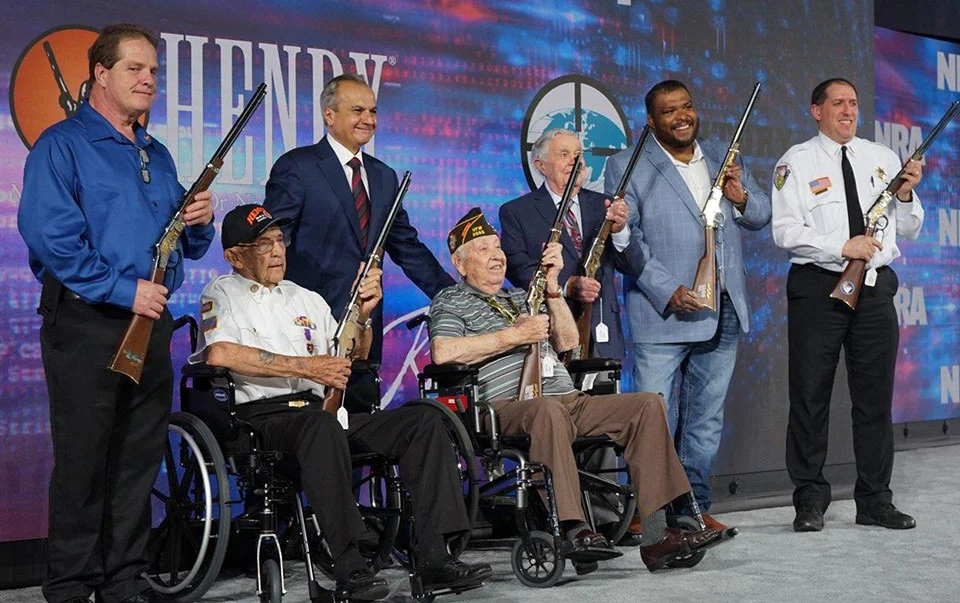 Henry Repeating Arms presents engraved rifles to military veterans and law enforcement at NRA Foundation Banquet