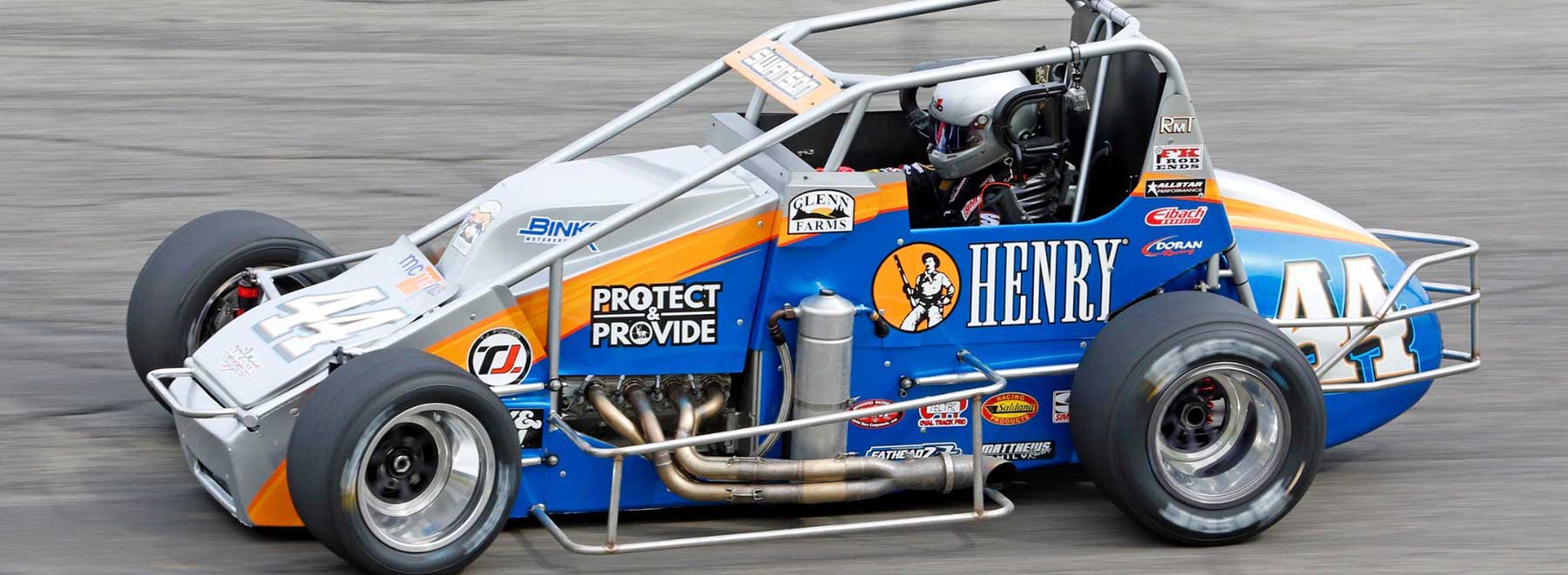 Henry Repeating Arms branded racing car on track