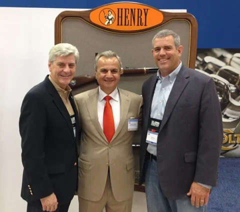Politicians and hunters visit the Henry Repeating Arms booth