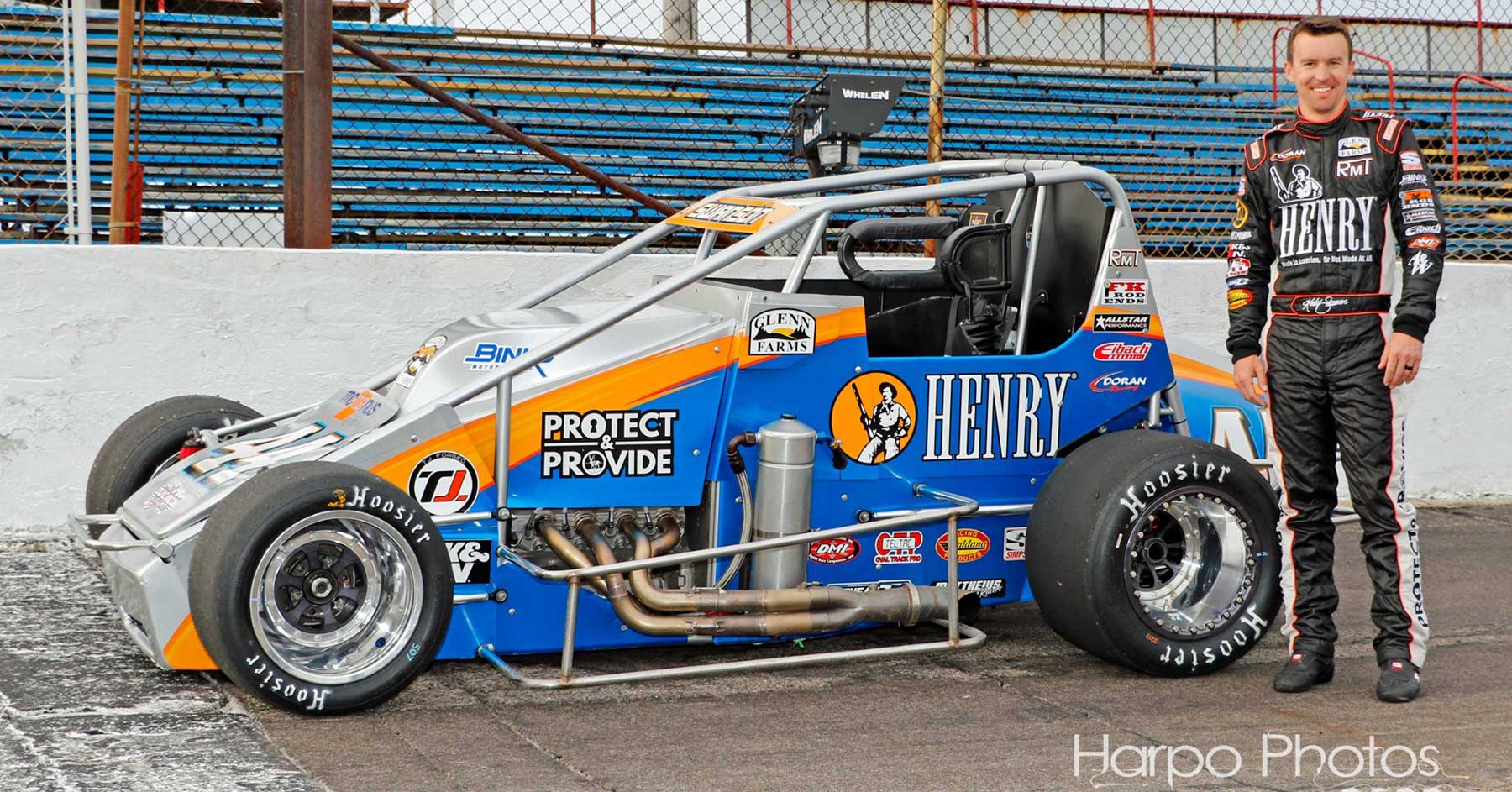 Henry Repeating Arms branded racing car on track