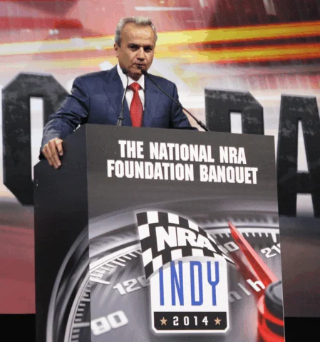 Man speaking at podium during the National Rifle Association Foundation banquet in 2014