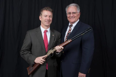 US Senator Rand Paul admiring a Henry Big Boy lever-action rifle during a Republican event