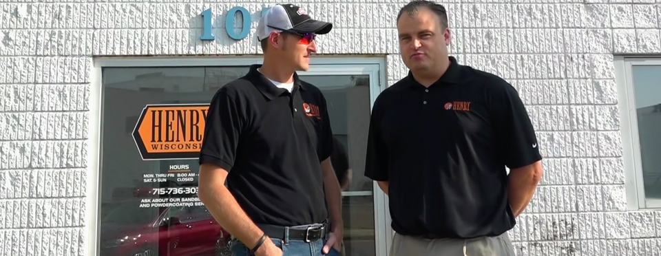 Henry Vice President and General Manager Andy Wickstrom with YouTube trick-shooter and host of HenryTV, 22Plinkster outside of Henry’s Rice Lake, WI facility. 